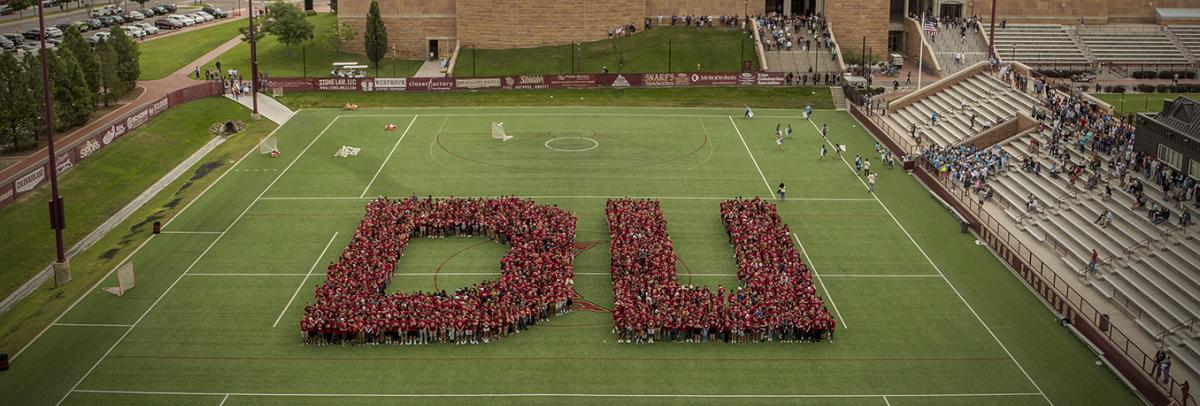 Students create"DU" on an athletic field